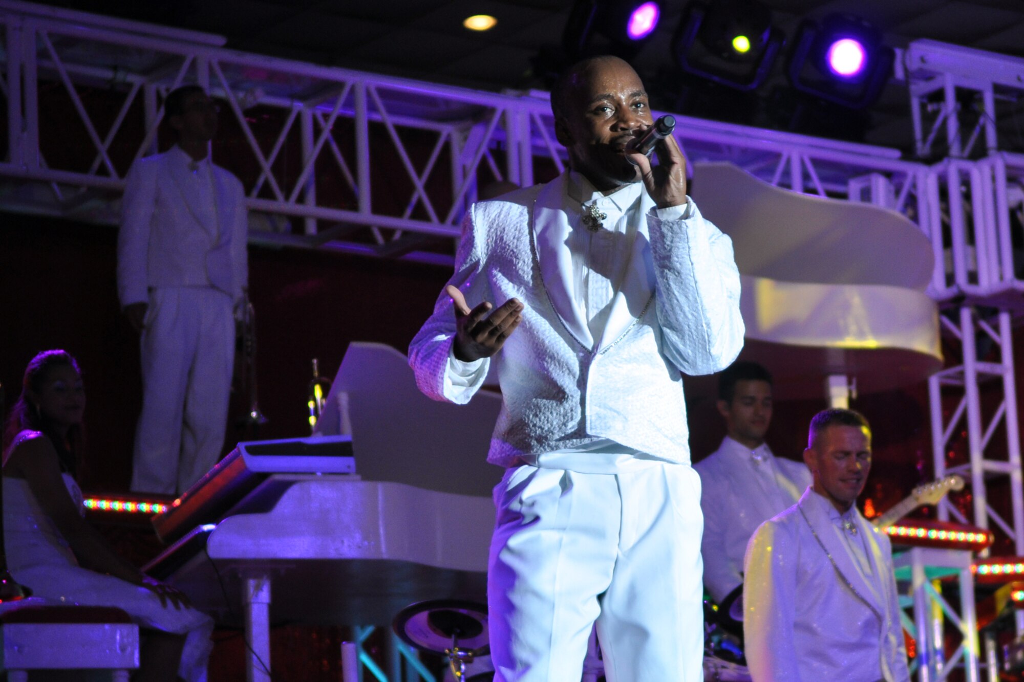 Senior Airman Demetrius Johnson, network infrastructure technician, 20th Communications Squadron, Shaw Air Force Base, SC, performs for a standing room only crowd during a free concert at Hoban Hall on Barksdale Air Force Base, La., August 12, 2009. Tops in Blue, and their Expeditionary Entertainers, have entertained servicemembers and their families, Coalition partners and audiences around the world for 56 years. (U.S. Air Force photo/Tech. Sgt. Jeff Walston)