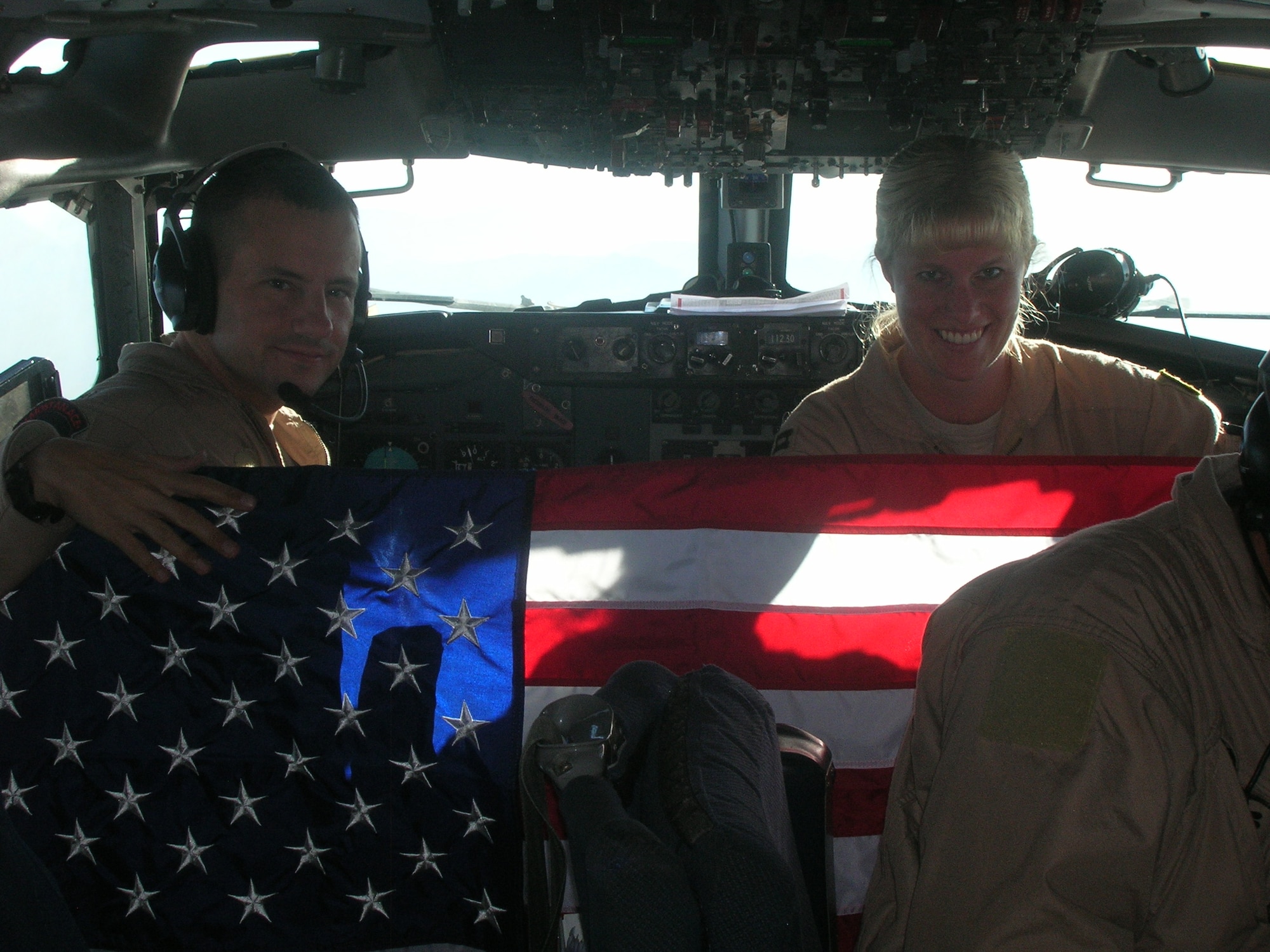 Capt. Kristen Thompson, pilot, 964th Expeditionary Airborne Air Control Squadron, and her deployed crew fly an American flag over the skies of Southwest Asia in Chief Foltz's honor. Photo courtesy of Captain Thompson.