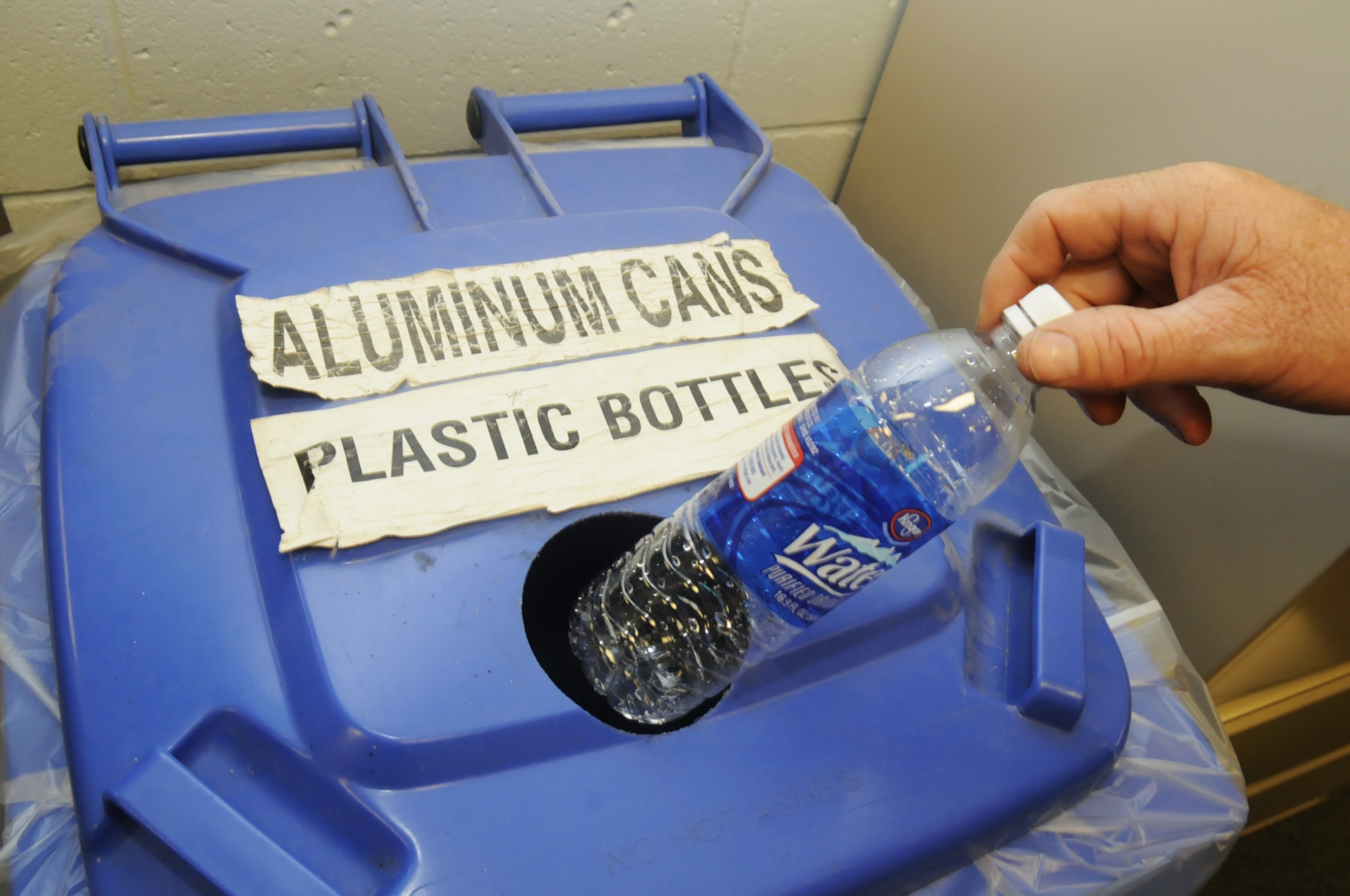 Aluminum cans may be placed in recycling containers along with plastic bottles. U. S. Air Force photo by Sue Sapp