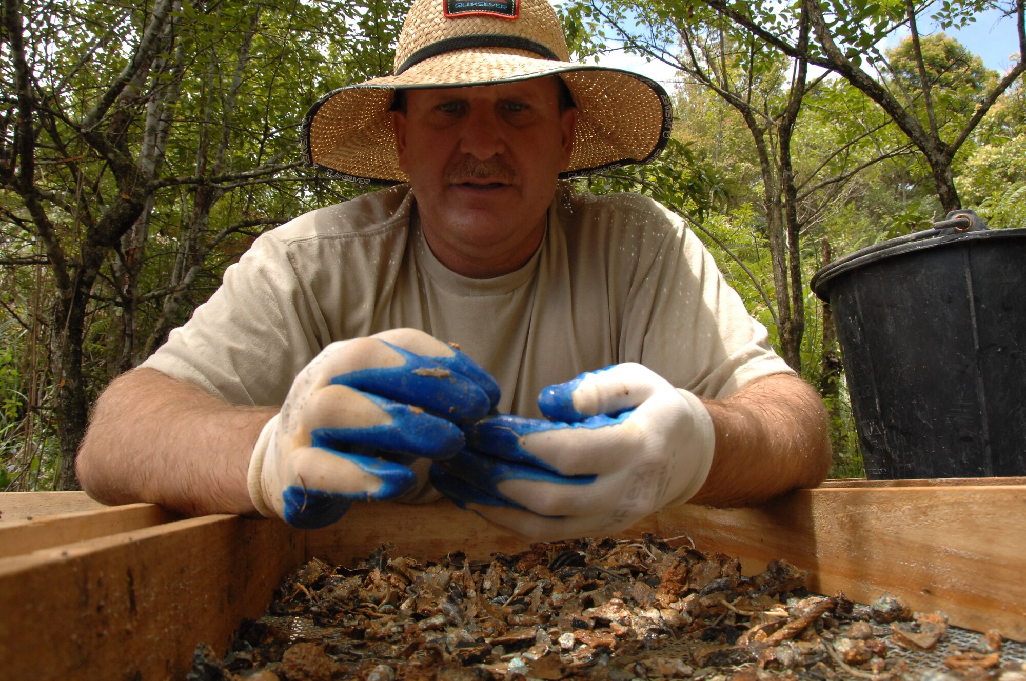 Master Sgt. Wesley Housel sifts through dirt while conducting a recent recovery mission in the Houaphan Province, Lao People's Democratic Republic. Sergeant Housel was a digger assigned to a 10-member recovery team on a 36-day deployment to Laos in an attempt to recover the remains of Americans lost during the Vietnam War. Sergeant Housel is with the 437th Operations Support Squadron and was assigned to the Joing POW/MIA Accounting Command.