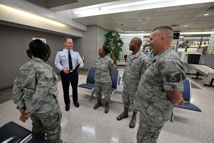 Col. John Wood visits with Charleston Airmen at the passenger terminal Aug. 13. Col. Wood is the 437th Airlift Wing commander.
