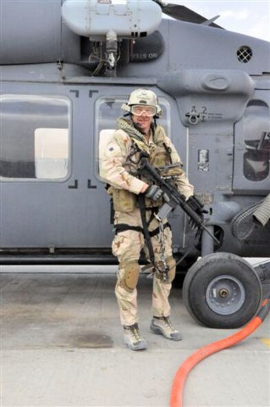 Master Sergeant Robert W. Bean, outfitted with more than 80 pounds of combat, communications and medical gear, prepares to embark on a mission in southern Afghanistan. His equipment includes a wearable computer and other technology developed by the Air Force Research Laboratory’s 711th Human Effectiveness Directorate—designed to reduce weight and increase U. S. warfighters’ efficiency in the field—which MSgt. Bean and fellow pararescue jumpers field-evaluated for application to their rescue-and-recovery mission. (Air Force photo)