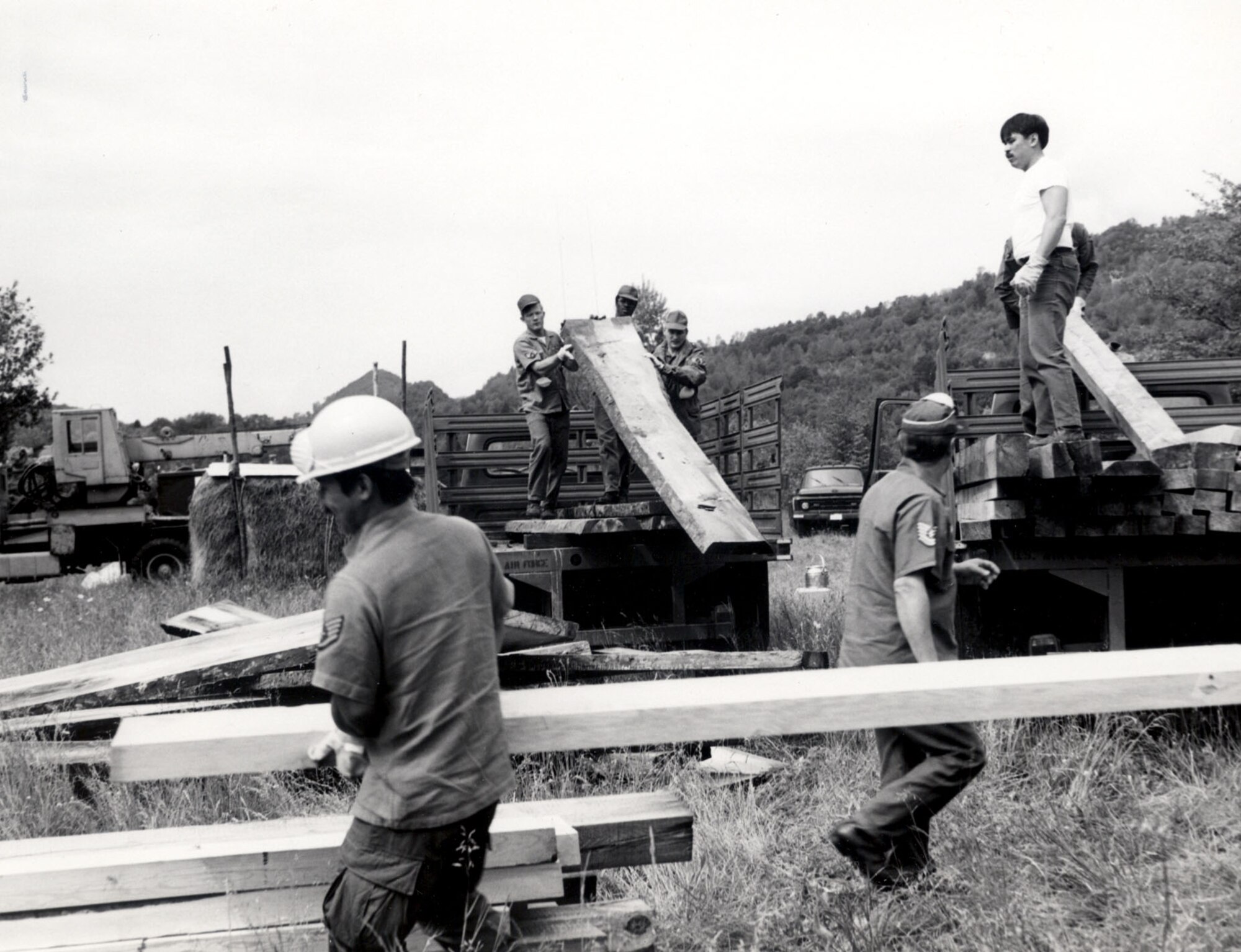 Airmen assigned to the former 40th Tactical Group at Aviano Air Base, Italy, help the area communities rebuild following the earthquakes which struck the Friuli-Venezia Giulia region of Italy from May to September 1976.  Airmen from the 40th TG were among the first to provide support to the region and it's 45,000-plus citizens left homeless.  (U.S. Air Force photo) 