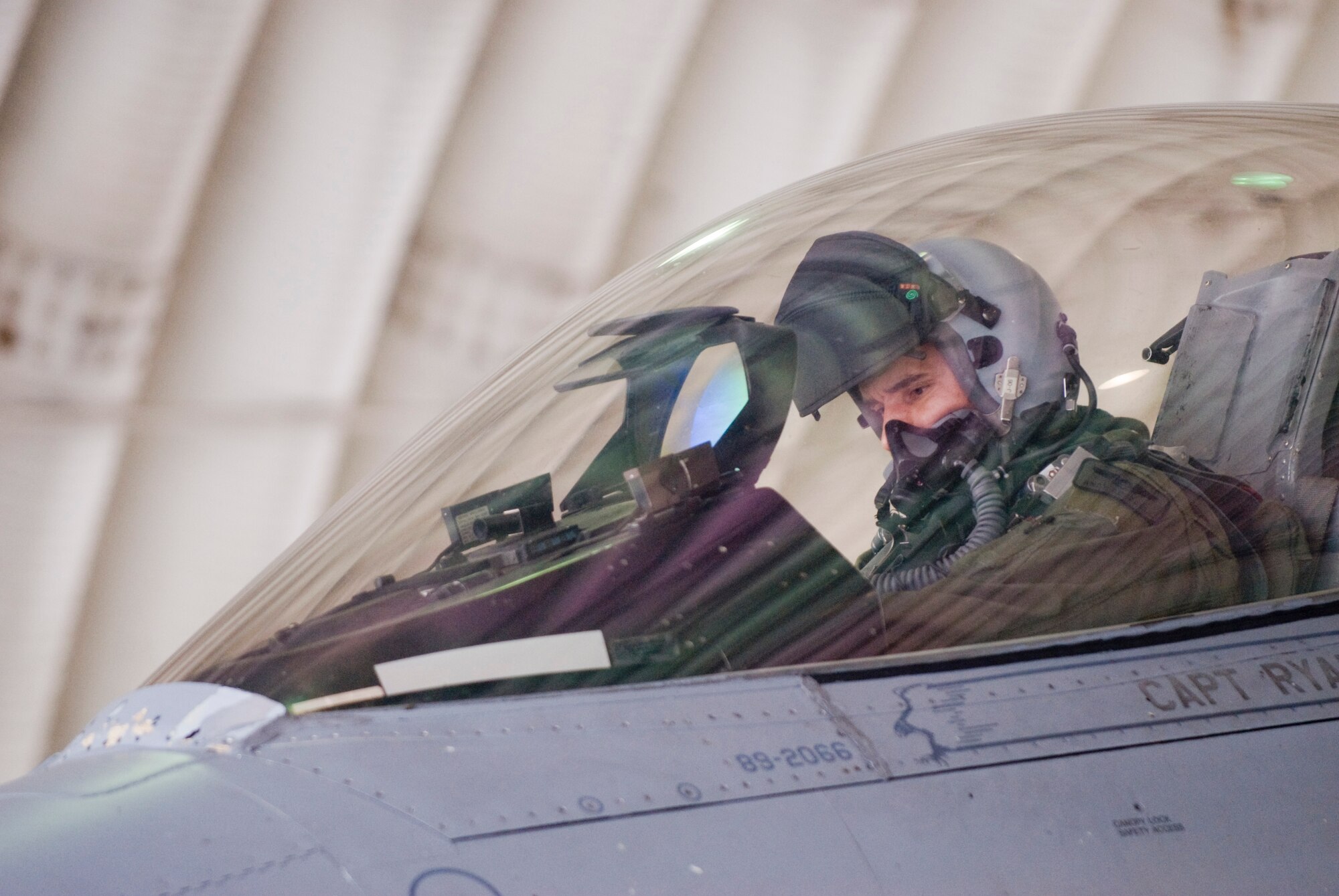 KUNSAN AIR BASE, Republic of Korea -- Capt. Andy "Wedge" Aduddell, 8th Fighter Wing, performs a system check on an F-16 Fighting Falcon.  Captain Aduddell received his call sign "Wedge" because he was a professional golfer prior to being a pilot. (U.S. Air Force photo by Senior Airman Jonathan Steffen)