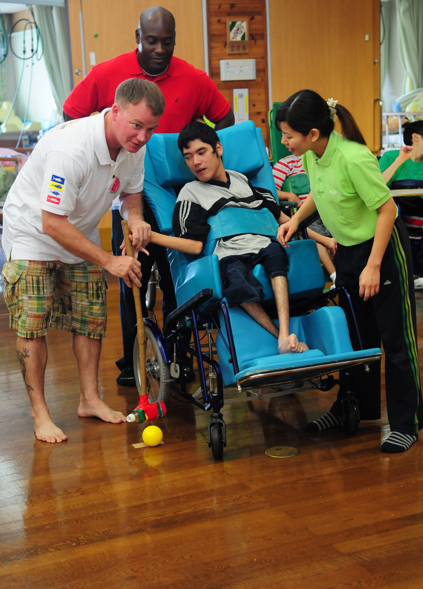 Airmen from the 18th Civil Engineer Squadron Power Pro Shop played games with the children of the Okinawa Children's Development Center, a facility for special needs, August 13. The Airmen delivered school supplies which included, notebooks, folders, pencils, color pencils, erasers, rulers, scissors, pencil sharpeners, and pencil cases. 
(U.S. Air Force photo/Tech. Sgt. Rey Ramon) 