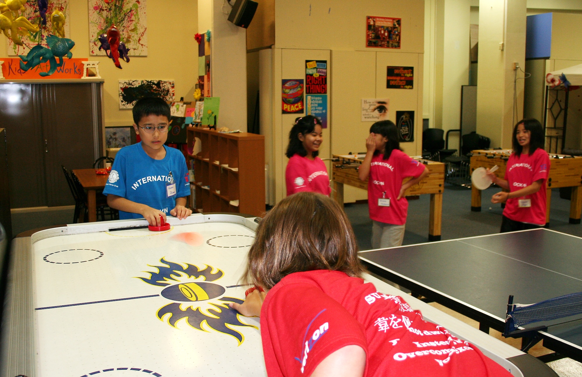 American and Okinawan children play games at the Kadena Youth Center during the International Youth Lock-in August 8. The children spent the night playing games, sampling American and Japanese cuisine and making new friends.   
(Courtesy photo)   