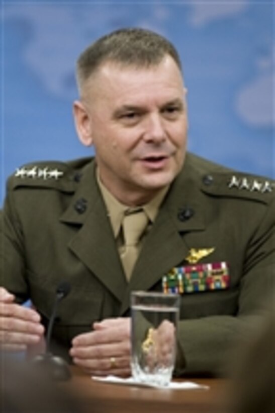 Vice Chairman of the Joint Chiefs of Staff Gen. James E. Cartwright, U.S. Marine Corps, speaks with members of the Pentagon press corps during a press conference with Secretary of Defense Robert M. Gates in the Pentagon on August 13, 2009.  