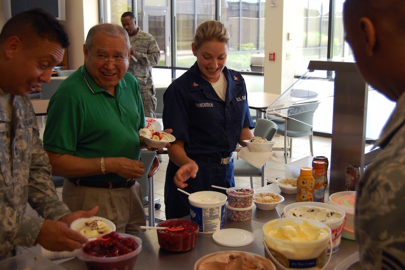 Members of the Air Force Mortuary Affairs Operations Center enjoy a well-deserved break during an ice cream social held by the Resiliency Team. Pictured, from left, are: U.S. Army Sgt. 1st Class Luis Valle, Mr. Art Navarro, and U.S. Navy Hospital Corpsman 2nd Class Danielle Van Orden. (U.S. Air Force photo/ Master Sgt. Robert Jones)