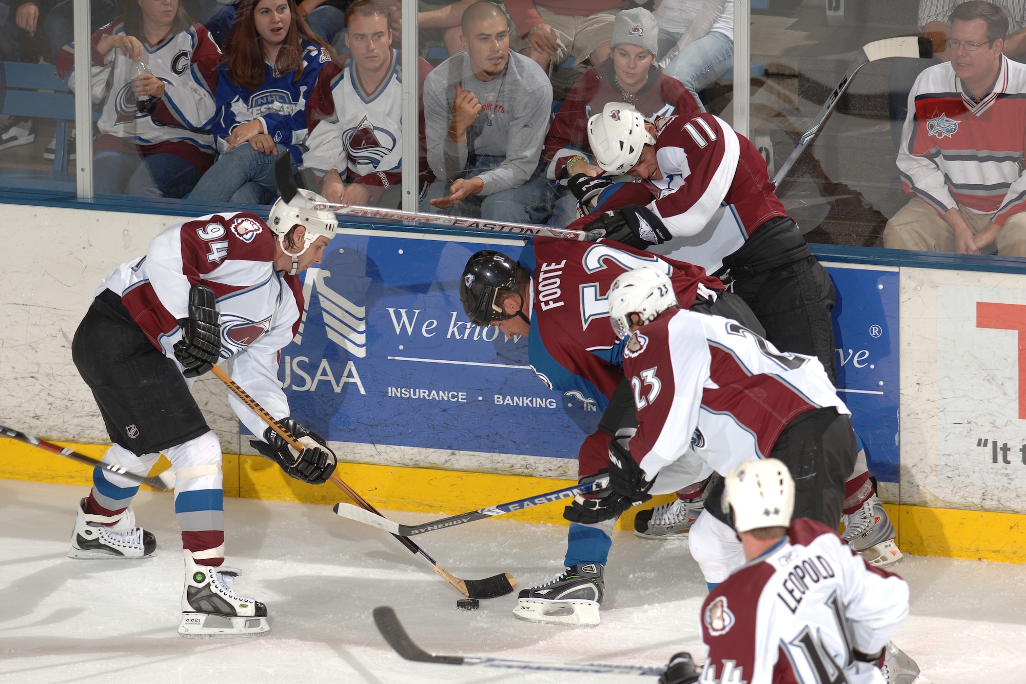 Colorado Avalanche players fight for the puck during their 2008 Burgundy/White scrimmage at the U.S. Air Force Academy's Cadet Ice Arena Sept. 22, 2008. The Avalanche are scheduled to return to the Academy Sept. 16, 2009, for their 2009 scrimmage. Tickets go on sale Aug. 15 at 9 a.m. through the official Falcons Sports Web site, http://www.goairforcefalcons.com/. (U.S. Air Force photo/Dave Armer)