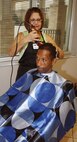Homelss veterans receive free haircuts at the annual "Standown" held here in Tampa at Hyde Park United Methodist Church (U.S. Air Force Photo/Capt. Shane O. Huff)