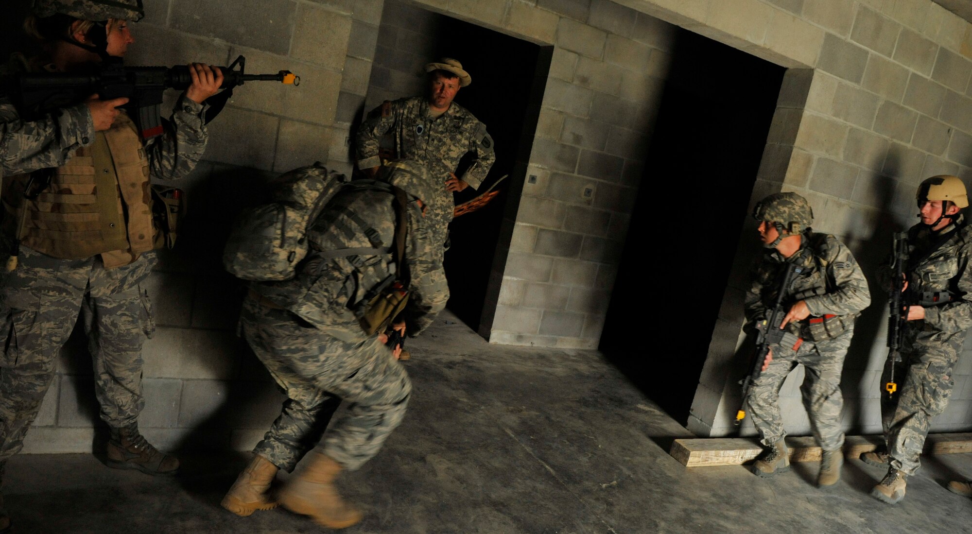 CAMP BLANDING, Fla. -- Members from the 93rd Air Ground Operations Wing, a tenant wing at Moody Air Force Base, Ga., participate in a Cyclogenesis course held here July 29. Students were sent to the training to learn U.S. Army basic warrior tasks, which include qualifying on certain weapon systems, small unit tactics and MOUT village training. (U.S. Air Force photo by Senior Airman Schelli Jones)