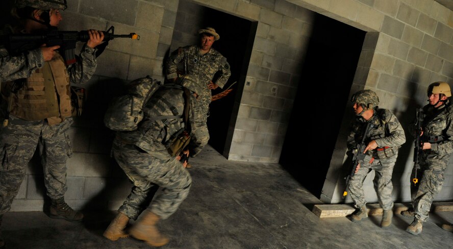 CAMP BLANDING, Fla. -- Members from the 93rd Air Ground Operations Wing, a tenant wing at Moody Air Force Base, Ga., participate in a Cyclogenesis course held here July 29. Students were sent to the training to learn U.S. Army basic warrior tasks, which include qualifying on certain weapon systems, small unit tactics and MOUT village training. (U.S. Air Force photo by Senior Airman Schelli Jones)