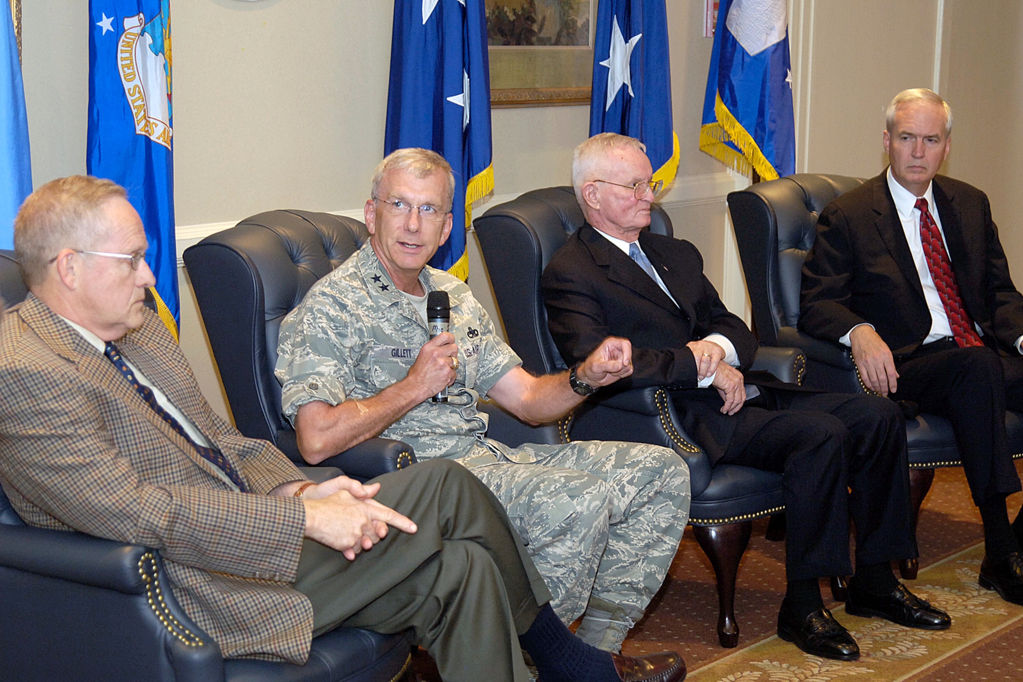 A panel of past and present Air Force logistics leaders answers questions from the audience during a recent Logistics Officer Association luncheon in the Tinker Club. From left are retired Lt. Gen. William Hallin, Warner Robins Air Logistics Center, Ga., commander from 1992-1995; Maj. Gen. David Gillett, current Oklahoma City Air Logistics Center commander; retired Maj. Gen. William Bowden, OC-ALC commander from 1985-1989; and Robert Conner, director of the ALC from 2005-2007. (Air Force photo by Margo Wright)