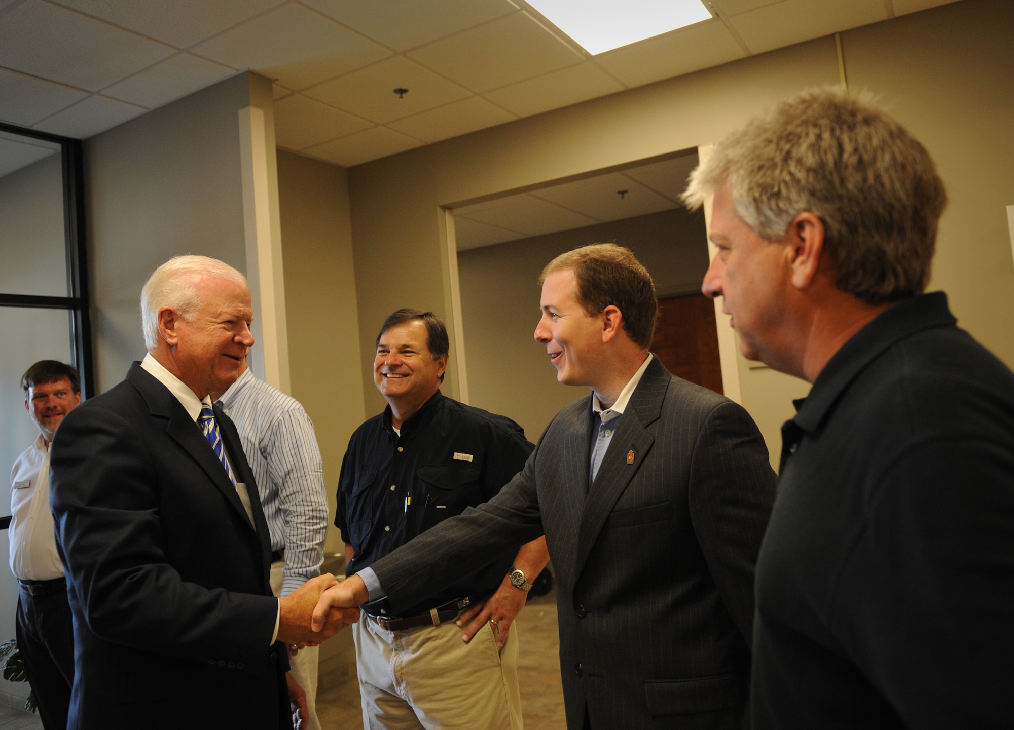MOODY AIR FORCE BASE, Ga. -- Sen. Saxby Chambliss of Georgia talks with John Eunice, 23rd Maintenance Group honorary commander, about Valdosta, Ga., and the surrounding communities during a base visit here Aug. 13. (U.S. Air Force photo by Senior Airman Gina Chiaverotti-Paige)