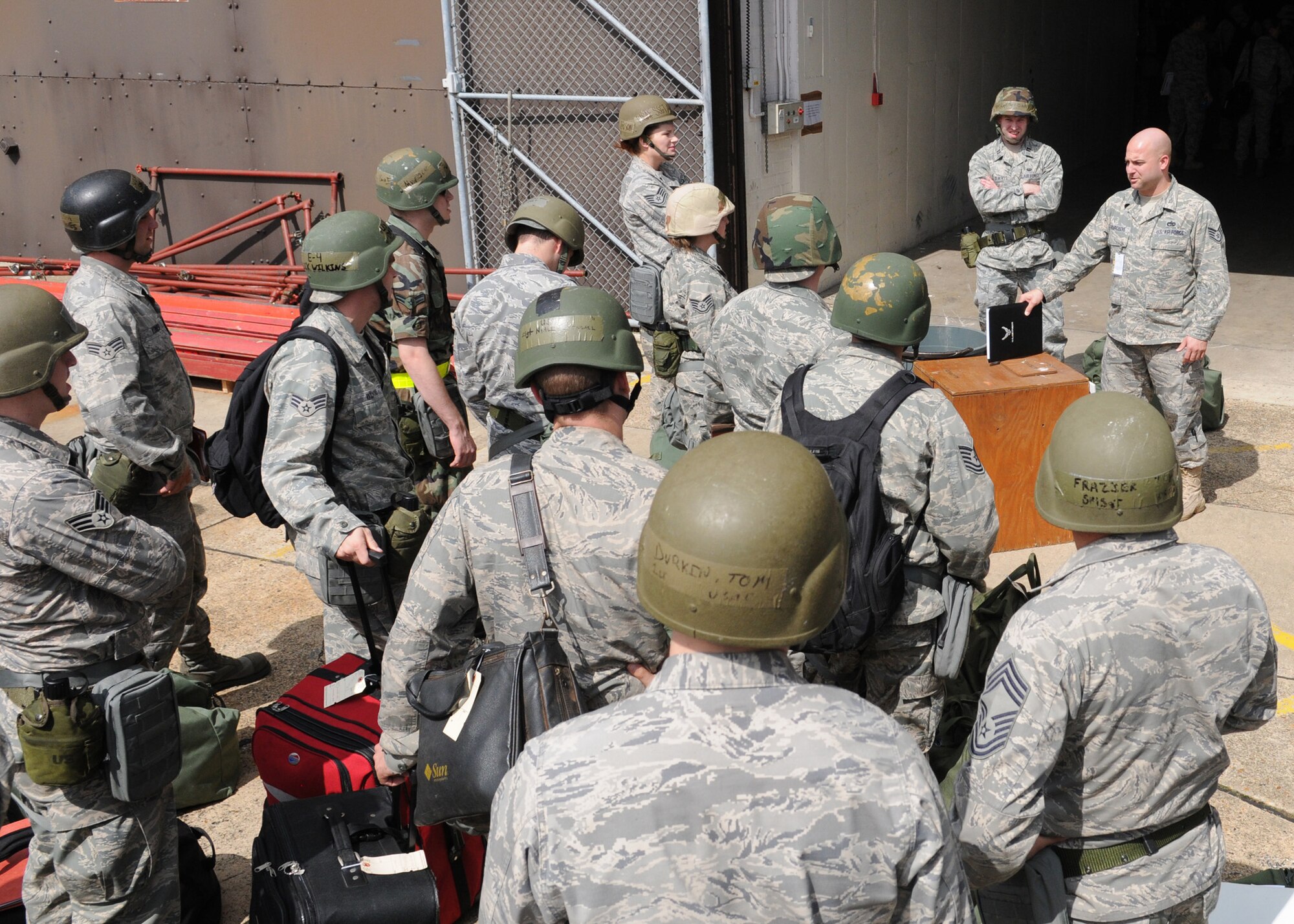 RAF MILDENHALL, England – Staff Sgt. Edward Bourgeois, 100th Logistics Readiness Squadron, brief Airmen participating in the Phase I portion of the exercise to ensure that each individual bag is accounted for. Airmen practice for possible real world deployment scenarios to ensure a smooth transition. (U.S. Air Force photo by Staff Sgt. Jerry Fleshman)