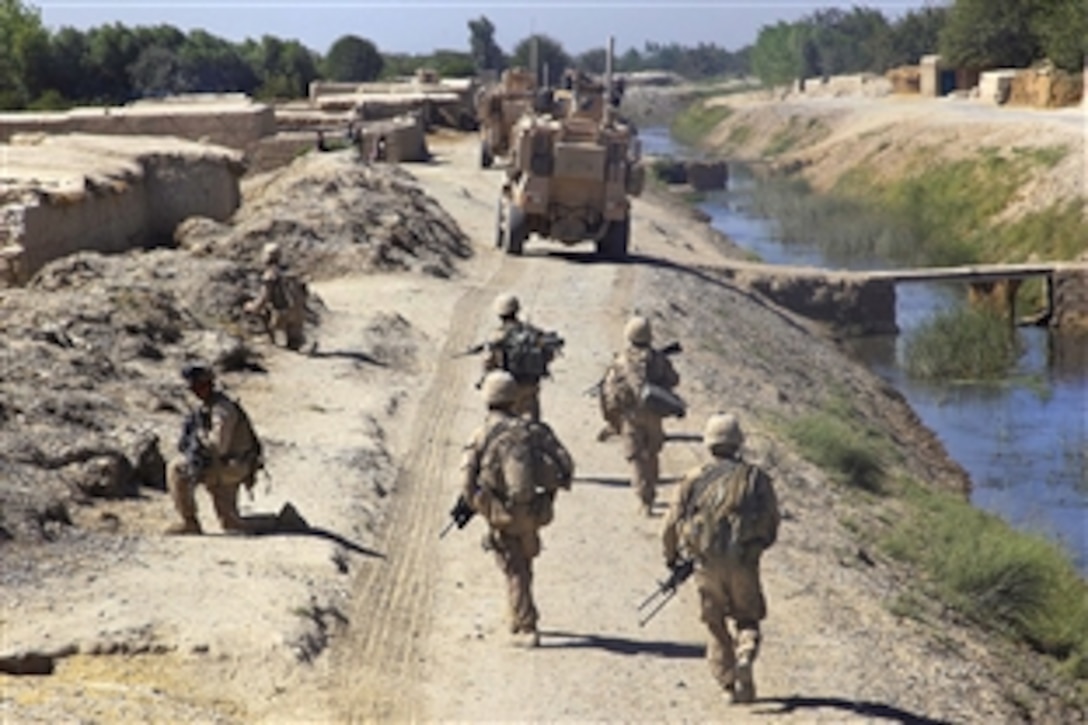 U.S. Marines conduct a security patrol in Nawa district in Helmand province, Afghanistan, Aug. 7, 2009. The Marines are assigned to Bravo Company, 1st Battalion, 5th Marine Regiment.