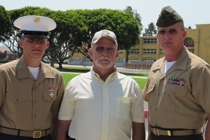 Pfc. Daniel L. Linnabary II, retired Staff Sgt. Vernon G. Linnabary Jr. and Chief Warrant Officer 4 Daniel L. Linnabary stand outside recruit barracks at Marine Corps Recruit Depot San Diego, Calif., after Pfc. Linnabary’s graduation from boot camp Aug. 14. Pfc. Linnabary represents the fourth immediate family member to earn his eagle globe and anchor maintaining the tradition of Linnabarys in the Marine Corps since 1963.