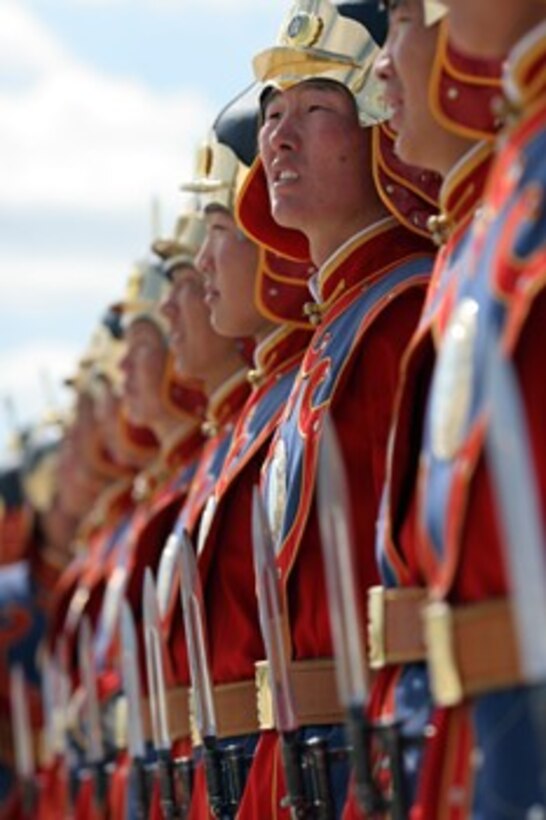 Mongolia’s Honor Guard prepares to march during the opening ceremony for “Khaan Quest“ a multinational peacekeeping training exercise Aug. 15 to Aug. 25. Participating nations include from the US, Mongolia, Singapore, Germany, Cambodia, South Korea, Japan, Bangladesh, India, Philippines, Thailand, and Malaysia. (Official Marine Corps photo by Lance Cpl. Daniel Balmer)