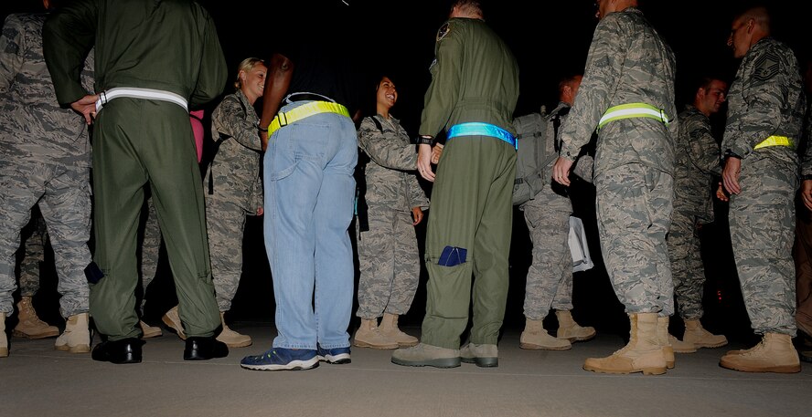 MOODY AIR FORCE BASE, Ga. -- 23rd Wing leadership, along with family members and friends, greet Airmen from the 23rd Aircraft Maintenance Unit who are returning to Moody after a six-month deployment. (U.S. Air Force photo by Airman 1st Class Joshua Green) 