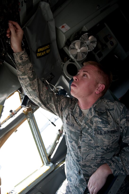 Senior Airman Ryne Zeller, 340th Aircraft Maintenance Unit aircraft electrical environmental systems technician, performs a preflight check to ensure a KC-135 Stratotanker is safe to fly, Aug. 11, in Southwest Asia. The KC-135 provides aerial refueling support to Air Force, Navy and Marine Corps and allied nation aircraft. Airman Zeller is a native of Chandler, Ariz., and is deployed from the Arizona Air National Guard,in support of Operations Iraqi and Enduring Freedom. (U.S. Air Force Photo/ Staff Sgt. Robert Barney)