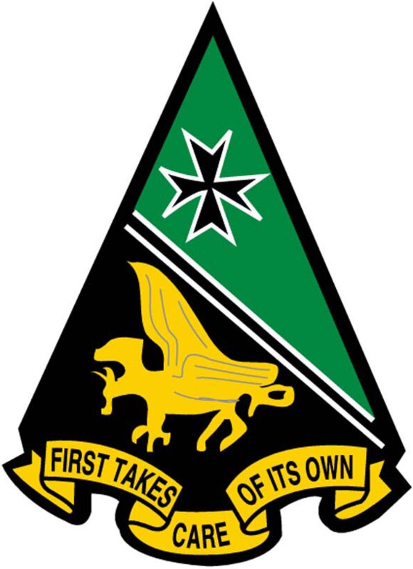 The emblem in the shape of a spearhead and bordered in black, has two colored fields, the upper green and the lower black. A black diagonal strip edged in white separates the fields. A black Maltese cross trimmed in white is on the green field and a gold griffin is on the black field. "First Takes Care of its Own" is written in black letters on a gold scroll beneath the black field.The griffin, a creature in Greek mythology, seeks hidden treasure while protecting its own treasure from intruders. The griffin symbolizes the search for the treasure from intruders. The griffin symbolizes the search for the treasure of knowledge in areas yet unknown and unexplored. The Maltese Cross, awarded to the bravest and most courageous military men, indicates a devotion to duty and a dedication to success. The cross, positioned above the black diagonal strip, indicates a higher ideal in life to which one should strive.The emblem is fashioned after the famous 1st Fighter Wing, the original squadron sponsor. The colors green, gold and black, the Maltese Cross and the diagonal strip are similar to the 1st Fighter Wing emblem.This is the original Cadet Squadron One patch.