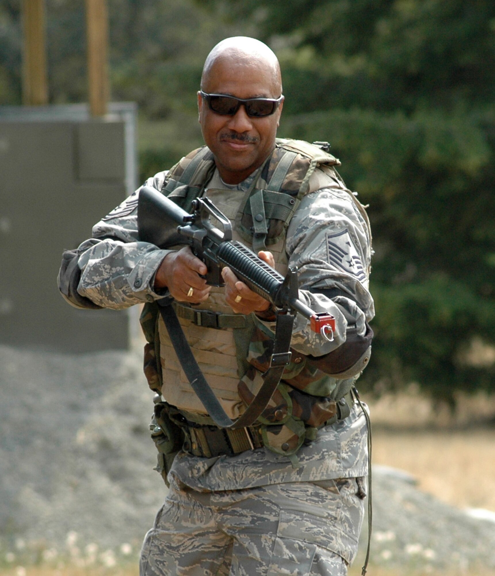 Master Sgt. Jon Conway, first sergeant for the 446th Civil Engineer Squadron, McChord Air Force Base, Wash., trains for a security drill during combat skills training in preparation for the squadron's Iraq deployment at the end of August. The squadron is sending a flight of about 40 Reservists in support of Operation Iraqi Freedom. (U.S. Air Force photo/Tech. Sgt. Jake Chappelle)