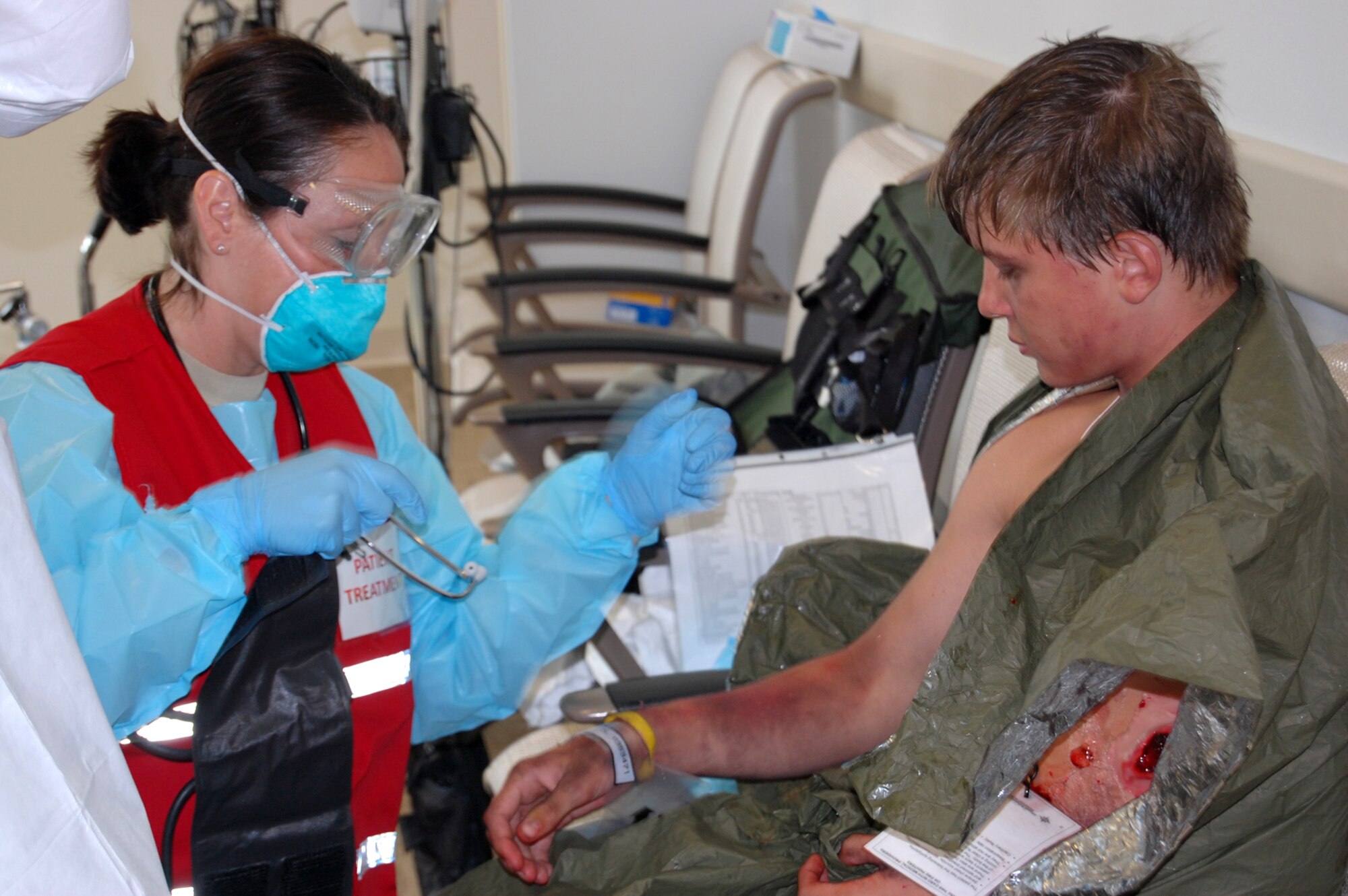 Tech. Sgt. Lisa Harelson, 341 Medical Operations Squadron maternal child flight NCOIC, takes a patient’s vital signs during a mass casualty exercise July 17. The exercise was a culmination of last week’s Medical Emergency Response Capability Assessment and Training. (U.S. Air Force photo/Staff Sgt. Marcus McDonald)