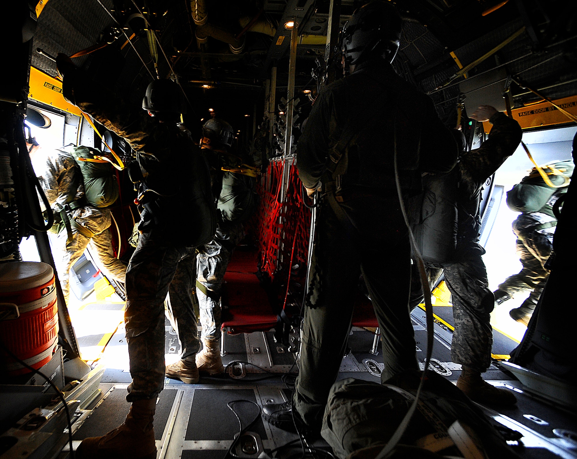 Army Rangers begin their parachute jump from a U.S. Air Force MC-130 Combat Talon II assigned to the 15th Special Operation Squadron from Hurlburt Field, Fla., during Ranger Rendezvous 2009 over Ft. Benning, Ga. More than 1,000 Rangers assigned to four Ranger battalions from across the country participated in a mass tactical jump flown by U.S. Air Force aircraft. (U.S. Air Force photo/Senior Airman Julianne Showalter)