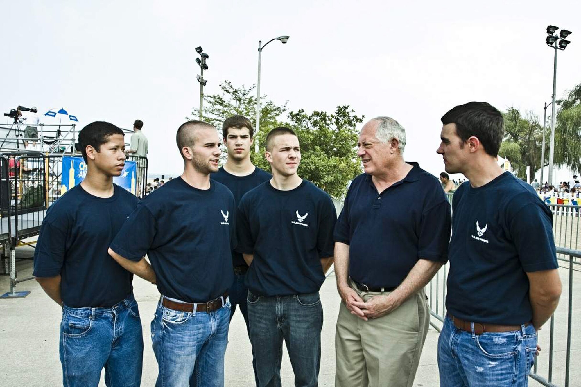Illinois Governor Pat Quinn talks with new Air Force Recruits following the oath of enlistment ceremony Aug. 15.  The ceremony, officiated by Maj. Gen. Gregory Feest, commander of Air Education and Training Command's 19th Air Force at Randolph Air Force Base, Texas, was observed by thousands of spectators attending the 51st Chicago Air and Water Show. Meeting with the governor are (from left) Nick Podjasek, from Carol Stream; Patrick Luehrsen, from Libertyville; Clay Turner, from Lombard; Tom Derosa, from Itasca; and Michael Leonard, from Round Lake.  (U.S Air Force photo/AFROTC Cadet Raleigh Randolph) 