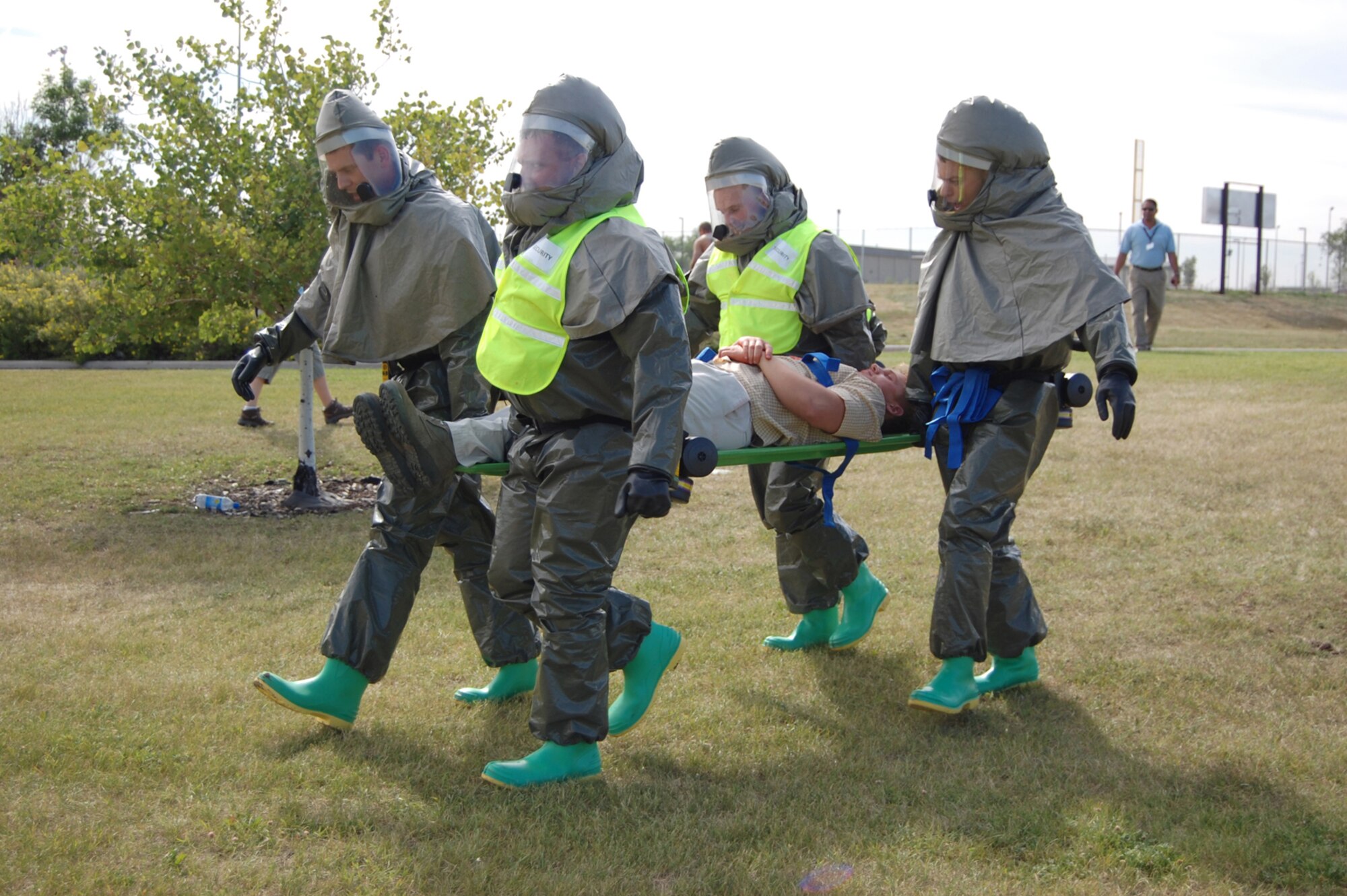 Malmstrom medics transport a patient with simulated injuries during a mass casualty exercise at Malmstrom Air Force Base July 17. The exercise was a culmination of this week’s Medical Emergency Response Capability Assessment and Training. The MERCAT evaluated Malmstrom medics on how well they provide care for patients, especially during emergencies. More than 100 volunteers with simulated injuries requiring immediate care were treated inside and outside of the clinic by 341st Medical Group medics. (U.S. Air Force photo/Staff Sgt. Marcus McDonald)