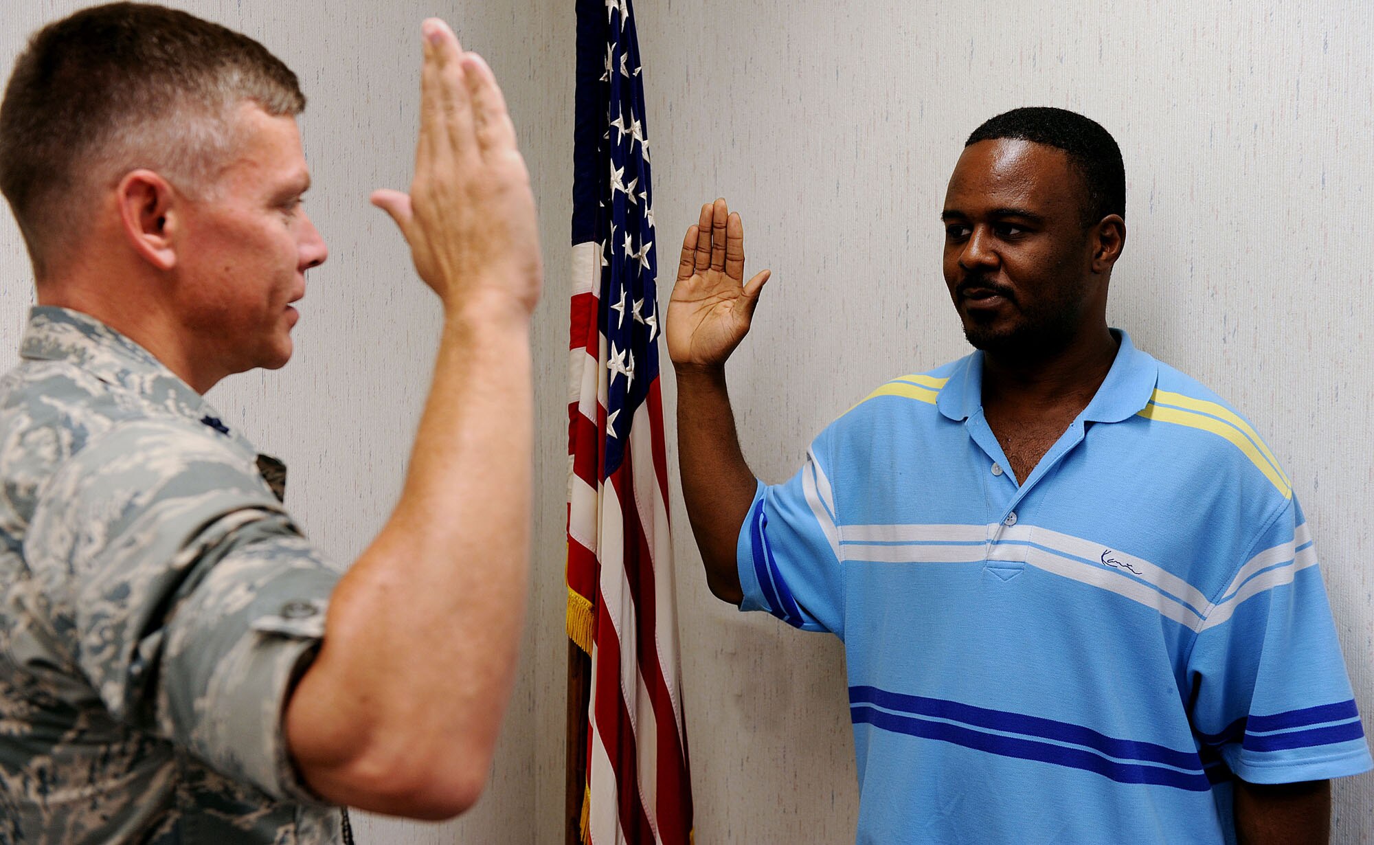 MOODY AIR FORCE BASE, Ga. -- Lt. Col. Gary White, 23rd Wing inspector general, swears in Dwayne Corker, Air Force Reserve enlistee, with the oath of enlistment here Aug. 13. Mr. Corker is the 332nd enlistment for the Eastern Recruiting Squadron, shattering their previous record of 331 recruits set in 2005. Mr. Corker was recruited by Tech. Sgt. David Carter, who reports to the Dobbins Recruiting Team. (U.S. Air Force photo/Airman 1st Class Joshua Green)