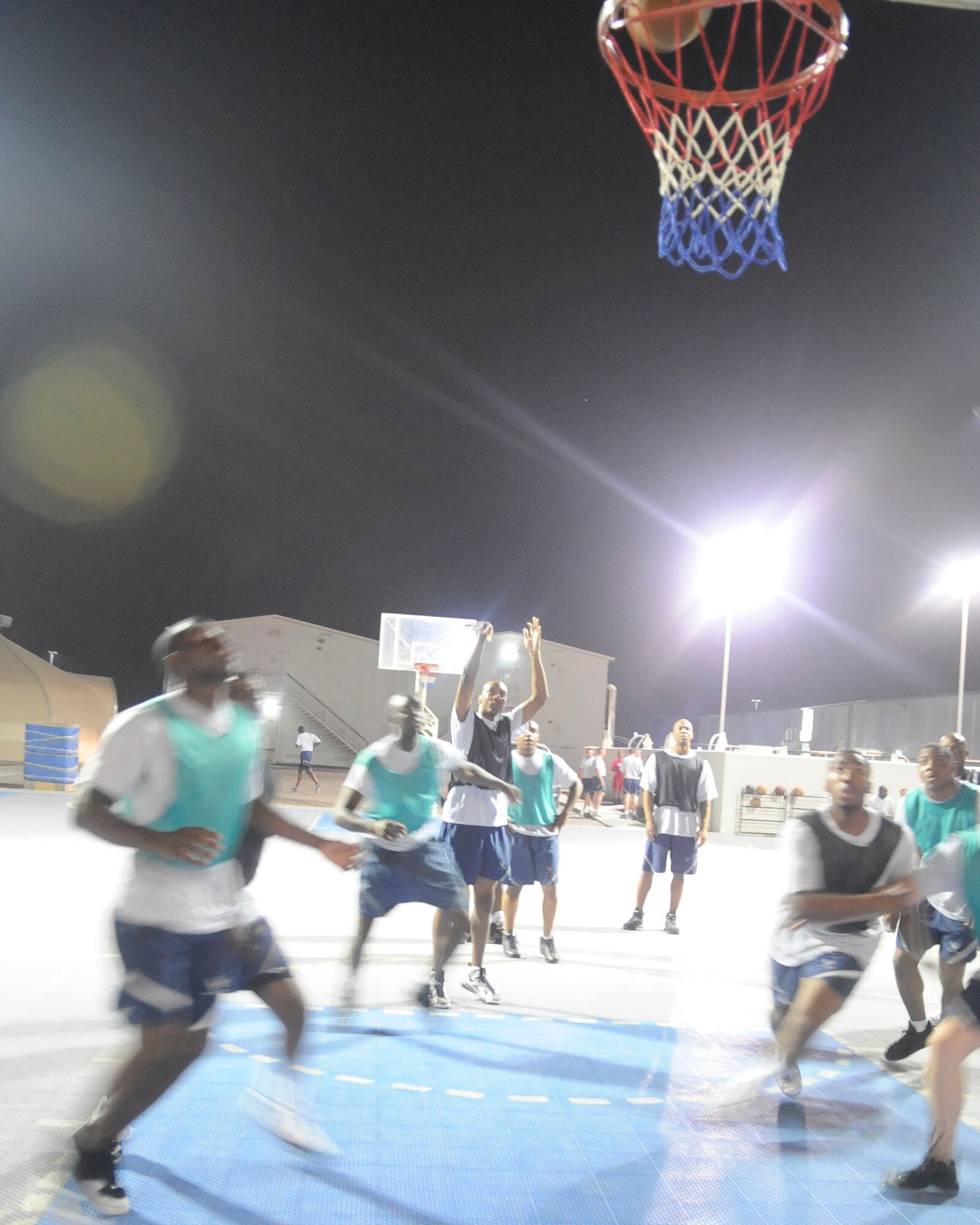 SOUTHWEST ASIA – Staff Sgt. Quenteric Reed, 380th Expeditionary Force Support Squadron, 99th Expeditionary Reconnaissance Squadron Basketball Team, shoots a free throw during the 380th Air Expeditionary Wing Basketball Championship Aug. 15. The 380th Expeditionary Civil Engineering Squadron won the game 41 to 39. Sergeant Reed is deployed from the 187th Fighter Wing, Danelly Field, Montgomery, Ala., and hails from Montgomery, Ala. (U.S. Air Force photo/Senior Airman Stephen Linch)