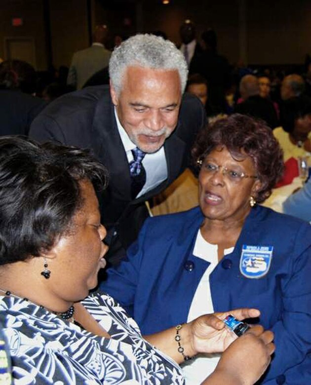 Stage and screen actor Ron Glass chats with chapter members at Brig. Gen. Stayce D. Harris's promotion during the 38th Annual Tuskegee Airmen, Inc., convention Aug. 7 in Las Vegas. (U.S. Air Force photo/Tech. Sgt. Amaani Lyle) 