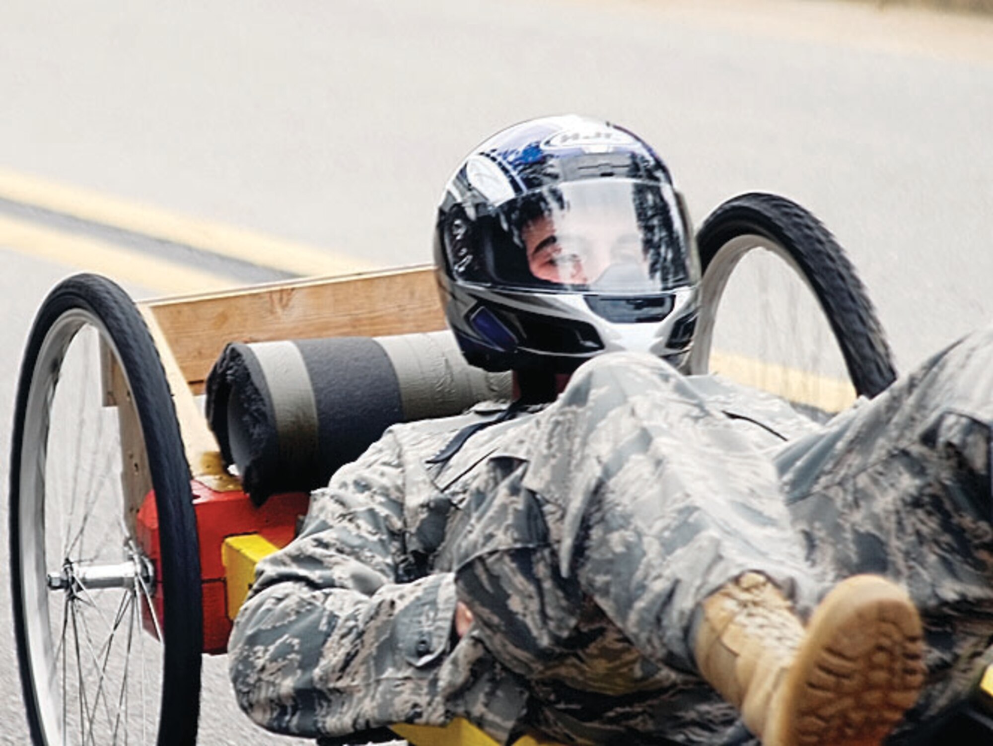 Staff Sgt. Steve Wilkerson, 43rd Communication Squadron, races down Reilly Street during the Pope Box Derby Aug. 6. (Photo by Senior Airman Mindy Bloem