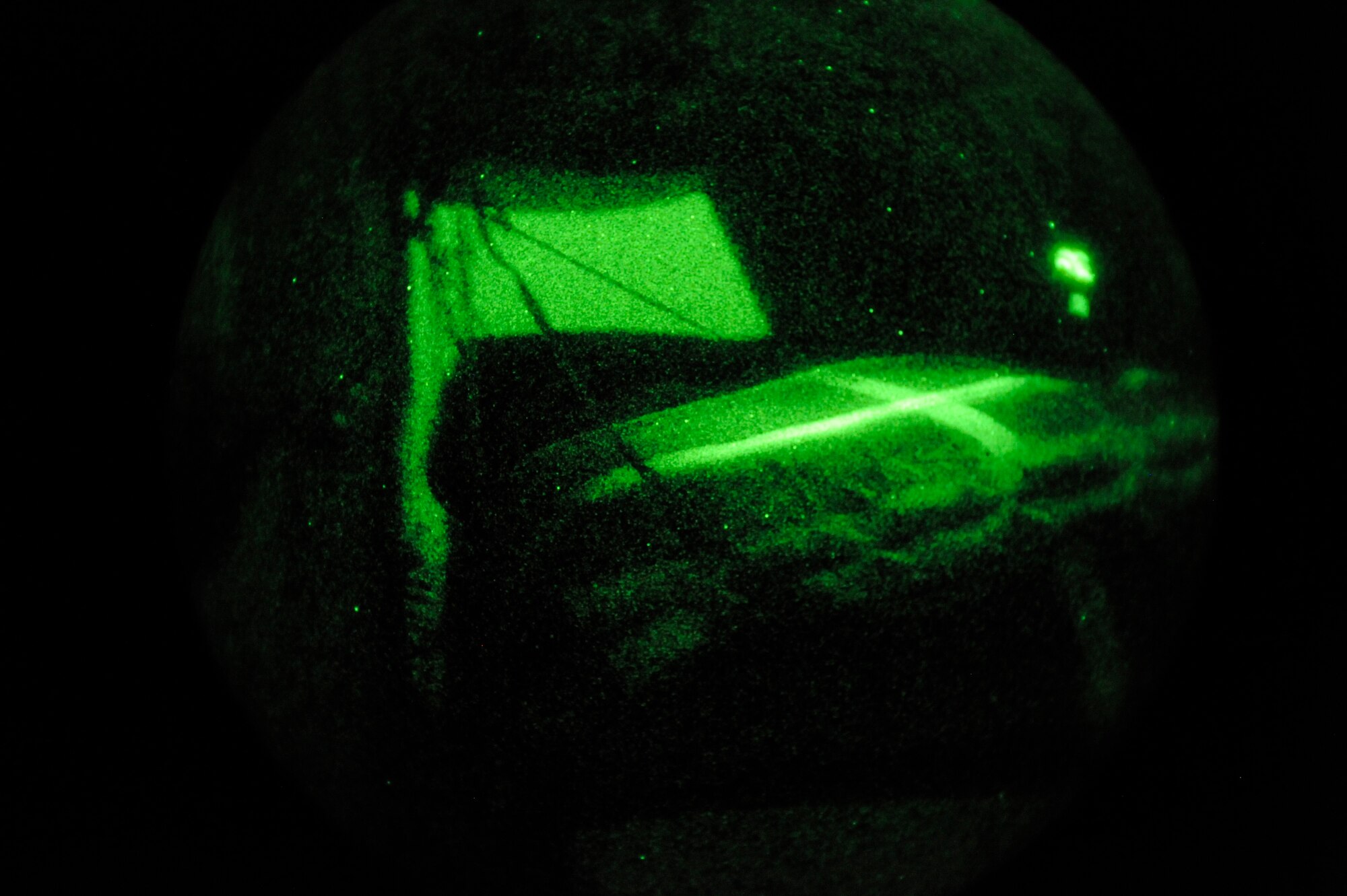Pallets of JP-8 fuel slide out of the cargo bay of a C-130J Super Hercules over southwestern Afghanistan July 17. (U.S. Air Force photo by Staff Sgt. Shawn Weismiller)