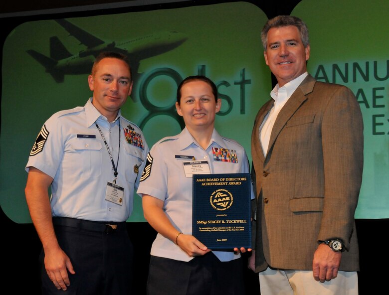 SPANGDAHLEM AIR BASE, Germany – A plaque is presented to now Chief Master Sgt. Stacey Tuckwell, 52nd Operations Support Squadron airfield manager, by the American Association of Airport Executives Senior Executive Vice President Spencer Dickerson and Chief Master Sgt. Robert Popp, Headquarters Air Force airfield management career field manager, during the AAAE’s 81st Annual Conference and Exposition June 15. The AAAE recognized Chief Tuckwell for being awarded the 2008 U.S. Air Force Airfield Manager of the Year Award. (courtesy photo)