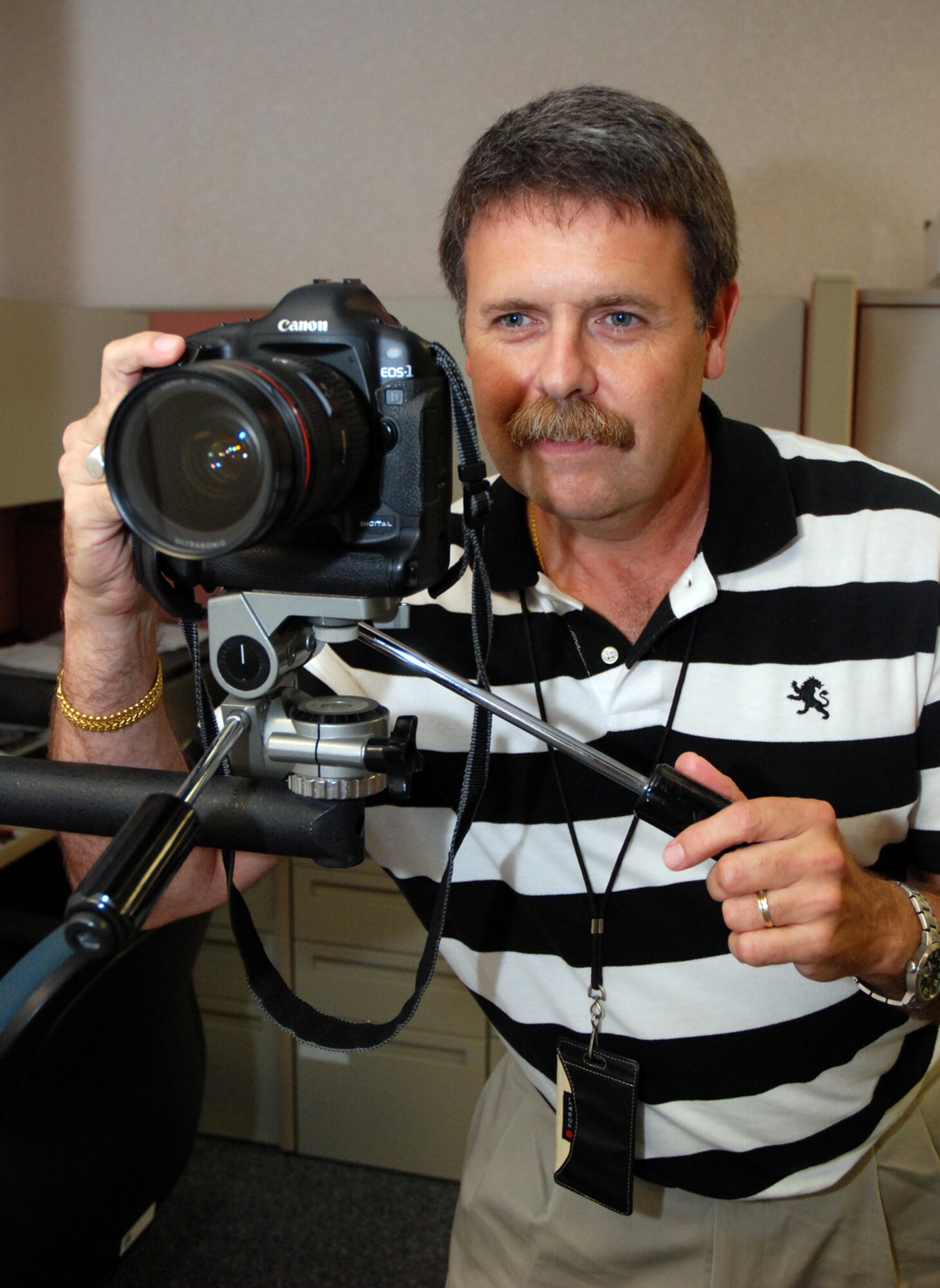 Don Peek, 94th Airlift Wing Public Affairs, is selected for the INNERview for week Aug. 17 to 21. Mr. Peek has been the base photographer for the past 10 years.  (U.S. Air Force photo/Shaun Shenk)