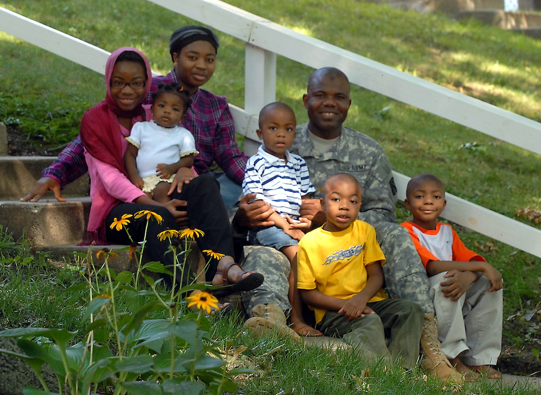 Chaplain (Maj.) Dawud Agbere and his family pose outside of their home in Normandy Village on Fort Leavenworth, Kan., Aug. 11, 2009.  U.S. Army photo by Prudence Siebert