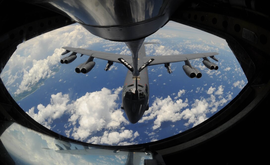 A B-52 Stratofortress bomber approaches for a refueling over the Pacific
Ocean Aug. 13. KC-135 Stratotankers, F-22 Raptors and B-52 Stratofortress
bombers took part in the 2009 Inaugural Turkey Shoot Competition, which allows air
expeditionary units to plan and execute tactical missions with airframes
that don't regularly train together.  The B-52's are deployed from Barksdale
Air Force Base, La., to Andersen AFB, Guam, to support U.S. Pacific
Command's Continuous Bomber Presence in the Asia-Pacific region.  (U.S. Air
Force photo/Senior Airman Christopher Bush)
