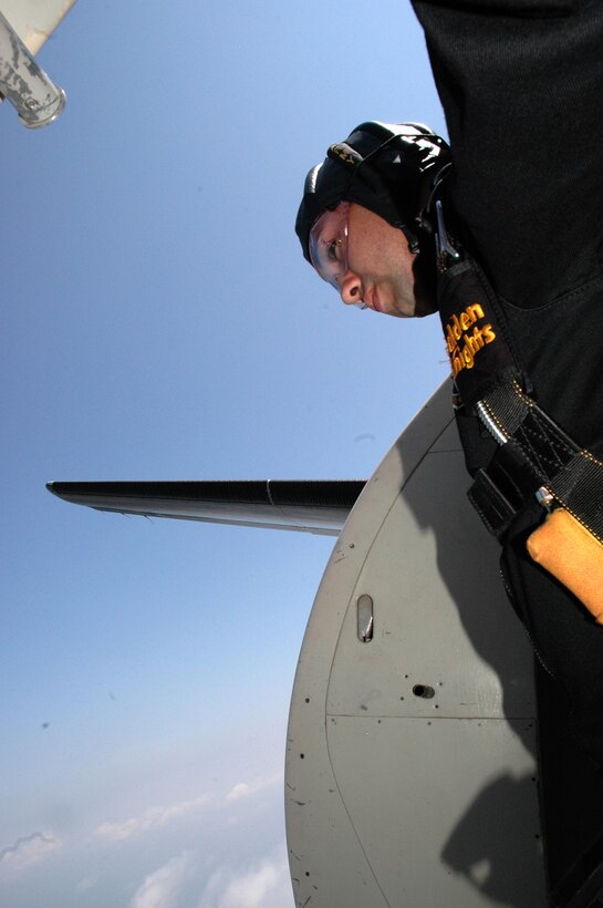 YOUNGSTOWN AIR RESERVE STATION, Ohio -- U.S. Army Staff Sgt. Howard Sanborn, an airborne infantryman with the U.S. Army Parachute Team Golden Knights, prepares for his jump during an aerial demonstration at the YARS "Thunder Over the Valley" Air Show and Open House, Aug. 9, 2009. The Golden Knights parachuters will descend to the flightline while the National Anthem is sung on the ground below as part of the opening ceremony. U.S. Air Force photo by Airman 1st Class Megan Tomkins