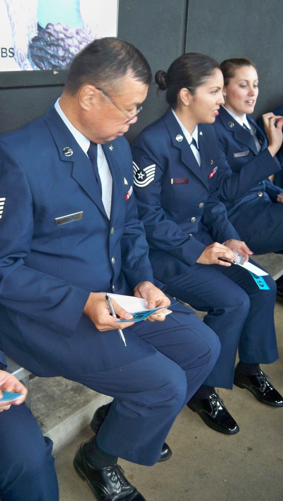 Technical Sergeant Freemont Dea completes a short questionnaire as he waits in line for the August 11, 2009 taping of The Price is Right in Los Angeles.  The popular game show served lunch to the all-military audience prior to the taping of their annual Veteran's Day show.  (U.S. Air Force photo/Master Sgt. Linda E. Welz)