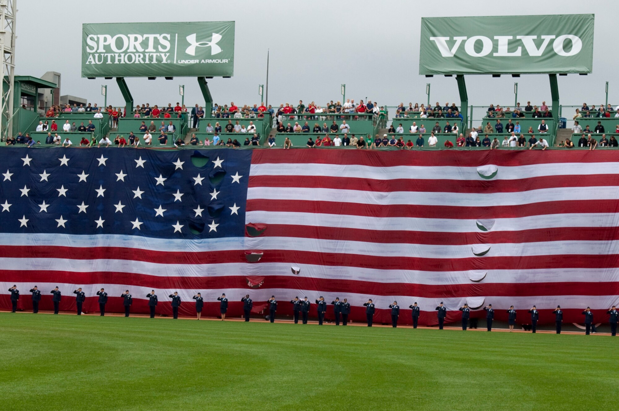 HANSCOM AIR FORCE BASE, Mass. –Hanscom Airmen participate in pre-game festivities on the field at Fenway Park on Aug. 13. More than 150 Airmen from Hanscom, as well as other service members from the local area, attended the Boston Red Sox game for free as part of the 'Tickets for Troops' program, in which season ticket holders donated their game tickets to active-duty troops. (U.S. Air Force photo by Rick Berry) 