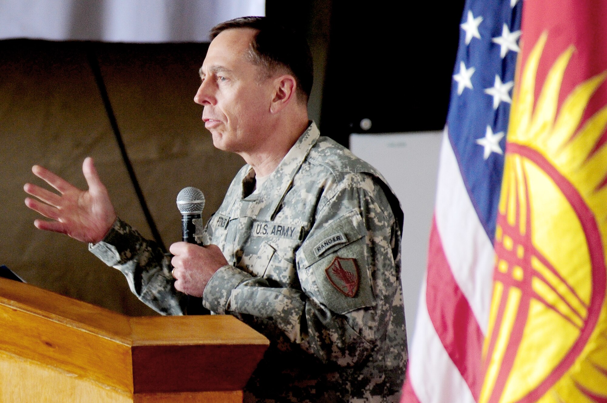 Gen. David Petraeus speaks to servicemembers Aug. 16 at the Transit Center at Manas, Kyrgyzstan. General Petraeus thanked military and civilian warriors at Manas for their continued contribution to Operation Enduring Freedom. General and Mrs. Petraeus toured several 376th Air Expeditionary Wing facilities and got a first-hand look at the deployed lifestyle at Manas. General Petraeus is the U.S. Central Command commander. (U.S. Air Force photo/Senior Airman Steele C. G. Britton)