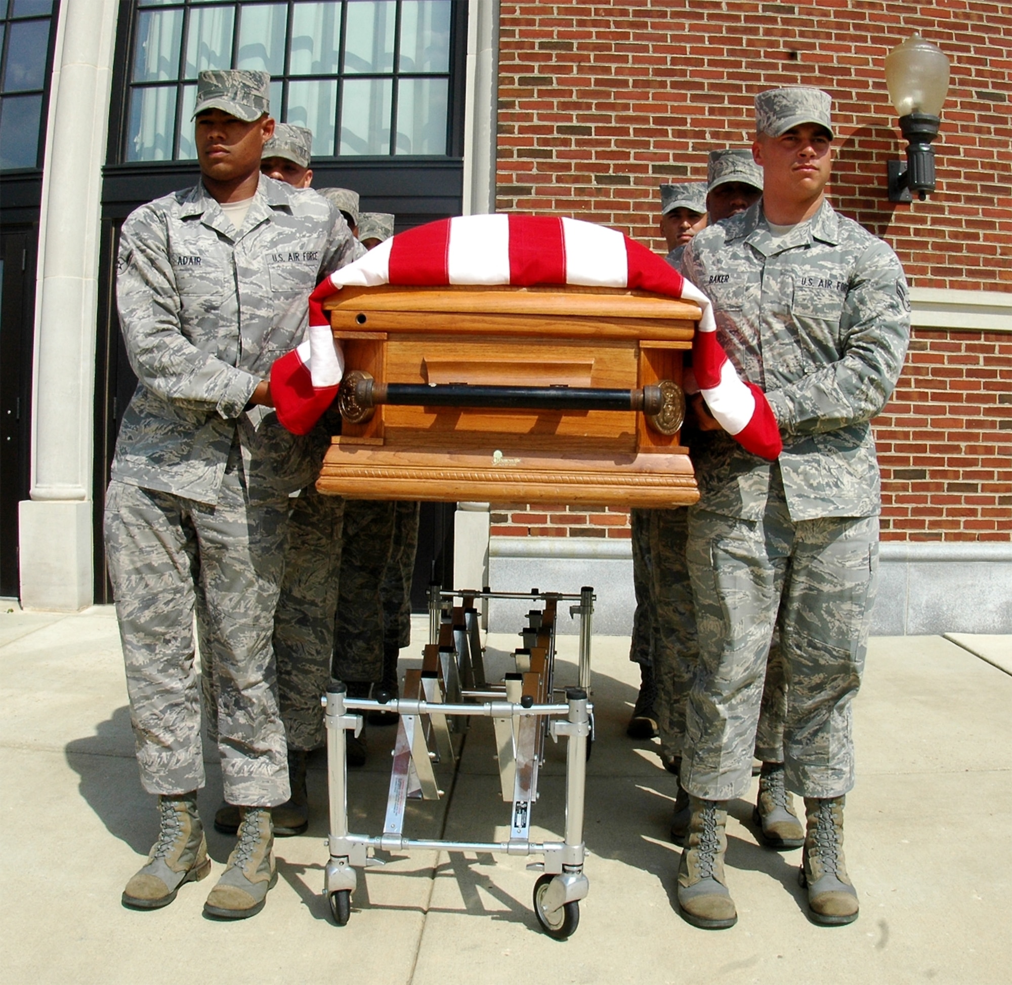 United States Honor Guard body bearers train with a weighted casket to prepare for funereal duties performed every day. Difficulties faced in training prepare the bearers for the difficulties they will face on the job. As part of the Honor Guard, body bearers represent the United States Air Force and go through a stringent screening process to ensure qualifications for the special duty. (U.S. Air Force photo by Airman 1st Class Katherine Windish)