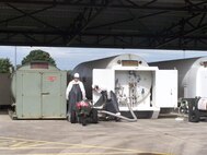 SEYMOUR JOHNSON AIR FORCE BASE, N.C. -- Tech. Sgts Roy Tart and Chuck Herring, reservists with the 916th Logistics Readiness Squadron, perform their fuel
duties transferring liquid oxygen into another container.  Both spent their yearly annual tour at Mildenhall, England. (U.S. Air Force photo by: SSgt. Monica Leonvelez, 916 LRS)
