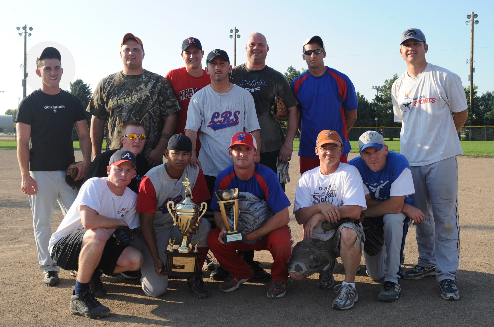 MOUNTAIN HOME AIR FORCE BASE, Idaho – Members of the 366th Logistic Readiness Squadron hold the championship trophy after defeating the 366th Operation Support Squadron 7-2 in the intramural softball championship game Aug. 10. (U.S. Air Force photo by Airman 1st Class Renishia Richardson)