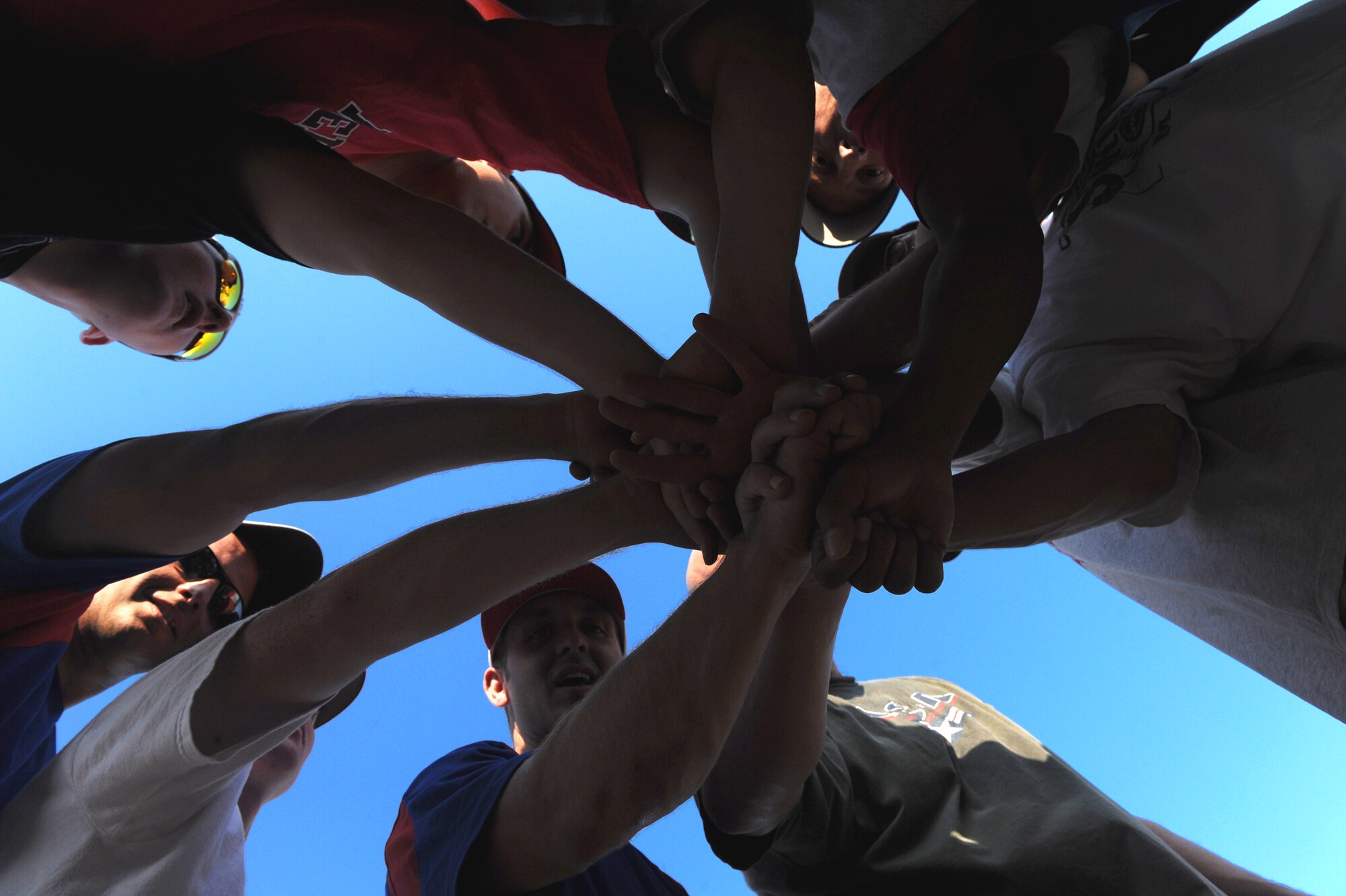 MOUNTAIN HOME AIR FORCE BASE, Idaho -- The 366th Logistic Readiness Squadron celebrates after defeating the 366th Operation Support Squadron 7-2 in the intramural softball championship game Aug. 10. (U.S. Air Force photo by Airman 1st Class Renishia Richardson)