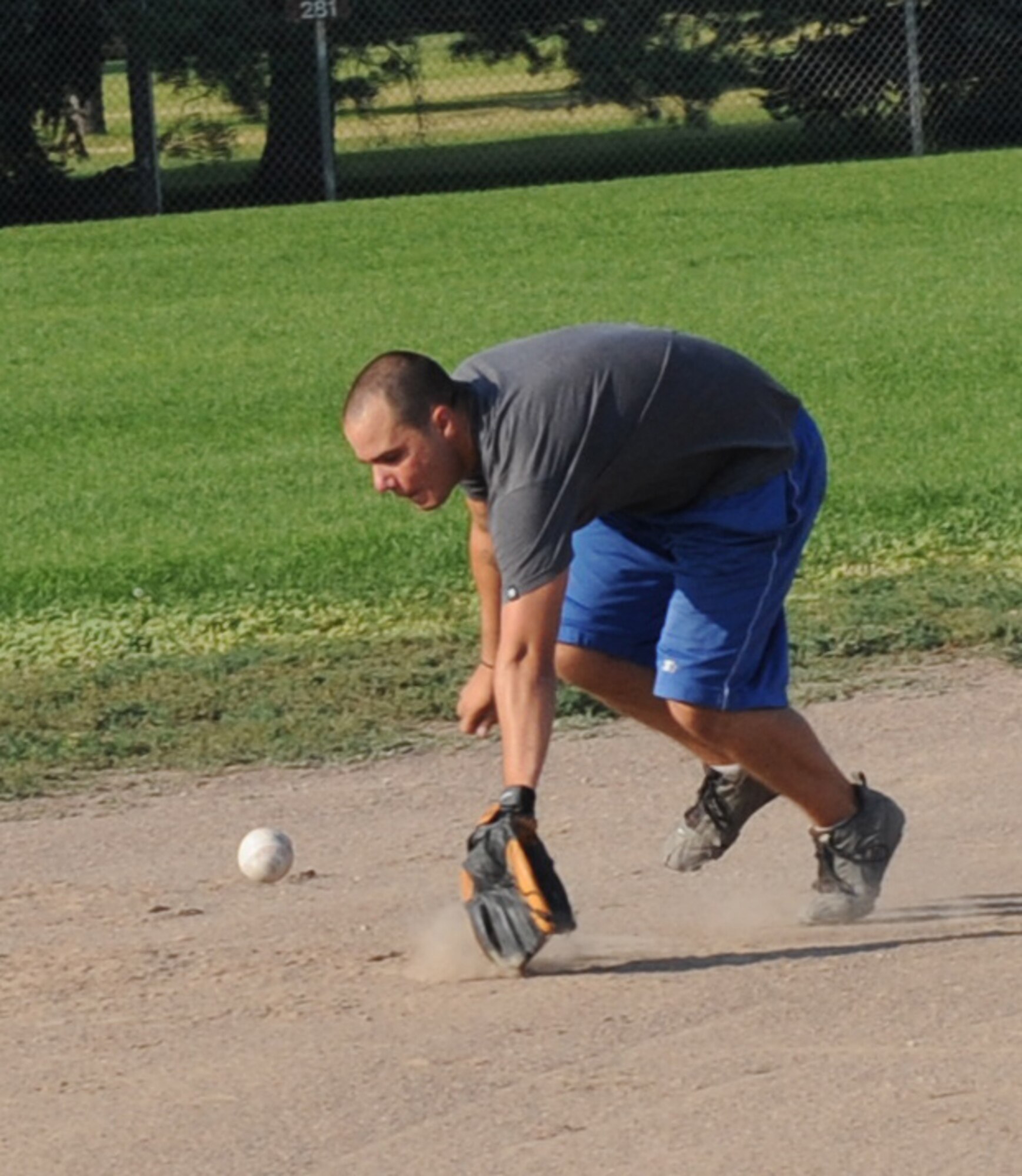 MOUNTAIN HOME AIR FORCE BASE, Idaho -- Matthew Eresman, 366th Operation Support Squadron shortstop, misses a line drive through the infield during the championship game against the 366th Logistic Readiness Squadron Aug. 10. LRS defeated OSS 7-2 for the intramural softball title. (U.S. Air Force photo by Airman 1st Class Renishia Richardson)