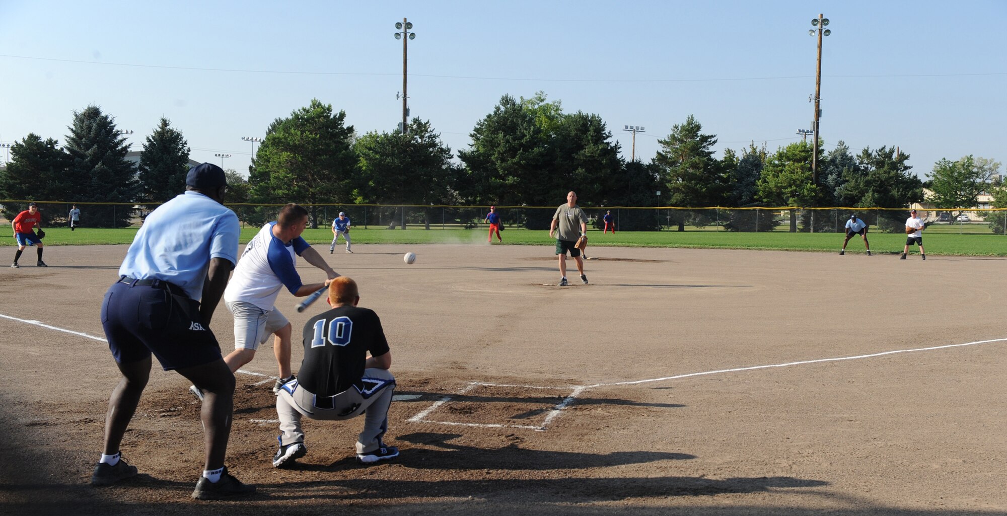 MOUNTAIN HOME AIR FORCE BASE, Idaho -- Daniel Muggelberg, 366th Operation Support Squadron, swings away at a pitch during the championship game against the 366th Logistic Readiness Squadron Aug. 10. LRS defeated OSS 7-2 for the intramural softball title. (U.S. Air Force photo by Airman 1st Class Renishia Richardson)