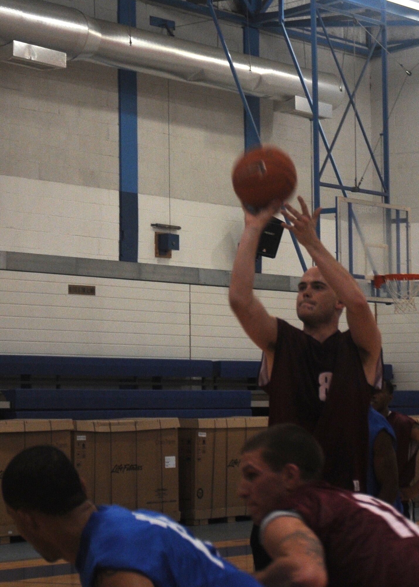 Jonathan Fraher, Cavaliers point guard, takes a free-throw in the fourth quarter of a Summer League Basketball game between the Cavaliers and the Nuggets on Aug. 16, 2009, at RAF Lakenheath, England. His free throw tied the score at 55. The Cavaliers clinched the victory by scoring their final basket with only seconds left on the clock, ending the game 57-55. (U.S. Air Force photo/Senior Airman Kristopher Levasseur)